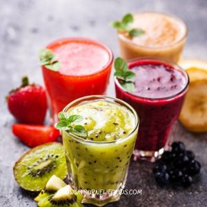 4 healthy smoothies coloured green, orange ,Purple and red