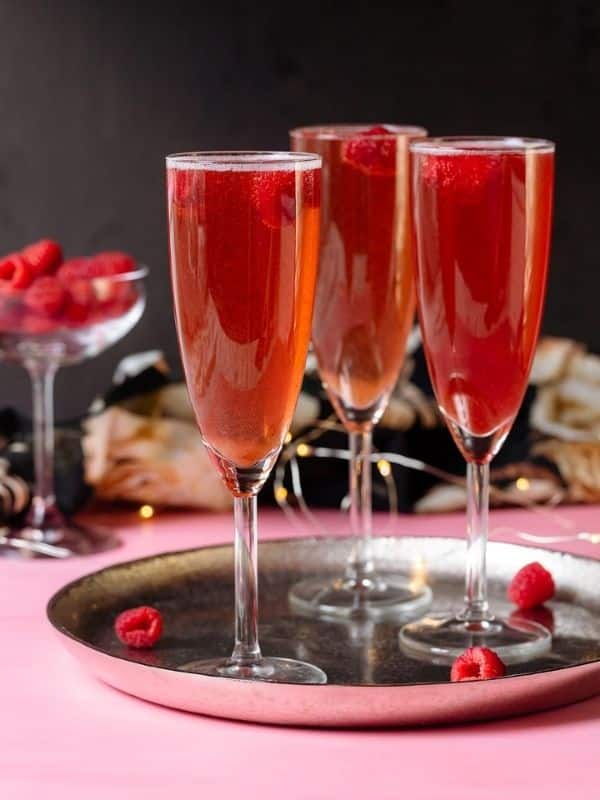 Chambord And Champagne Cocktail With Raspberry Syrup