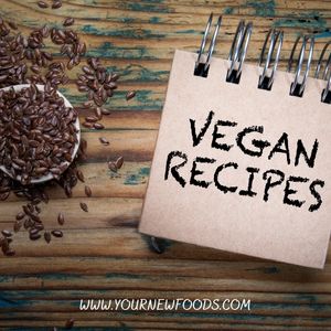 vegan recipes note pad with spices in a bowl next to it