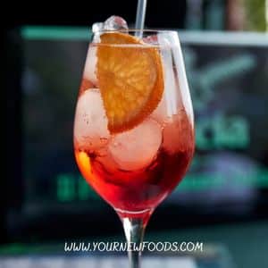 Prosecco Cocktail with aperol in a large wine glass
