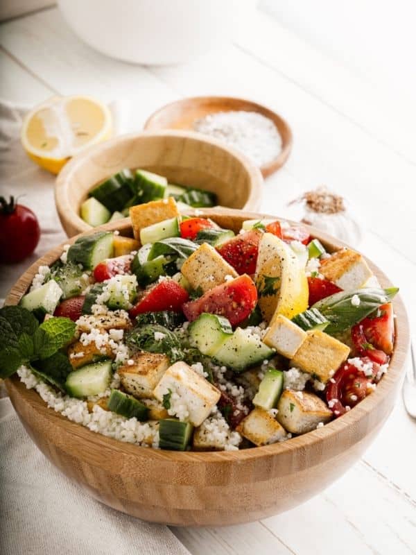 This light and fluffy vegan couscous salad with tofu is loaded with fresh and flavorful salad ingredients and a simple lemon juice dressing – perfect as a refreshing side dish or light main meal.