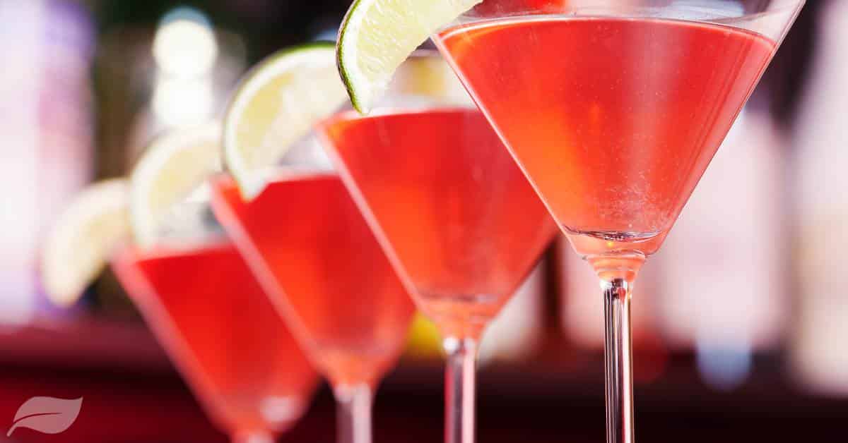 Cosmopolitan Cocktails with lime wedges