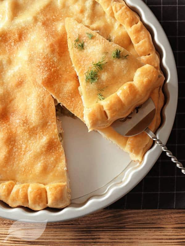 Turkey pot pie in a white casserole dish