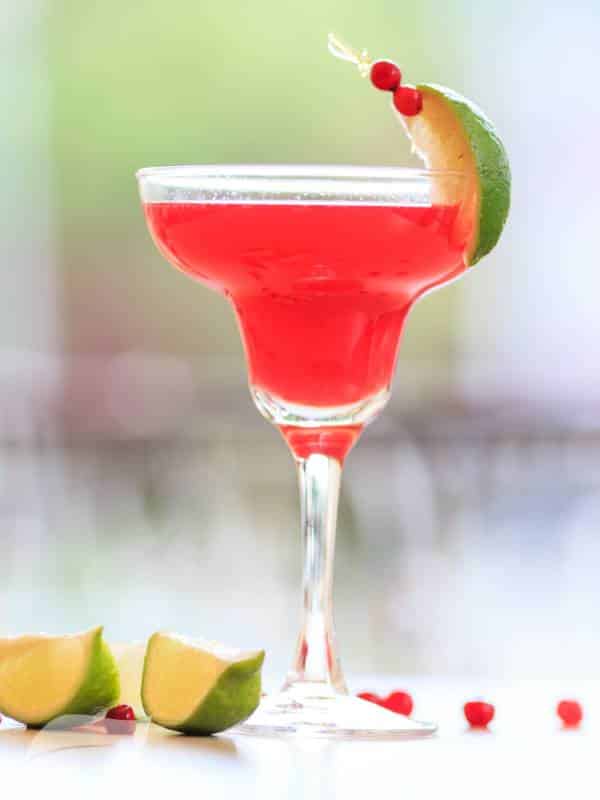 cosmopolitan cocktail with lime wedge