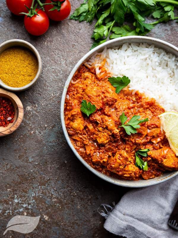 Chicken Tikka Masala with rice in a bowl