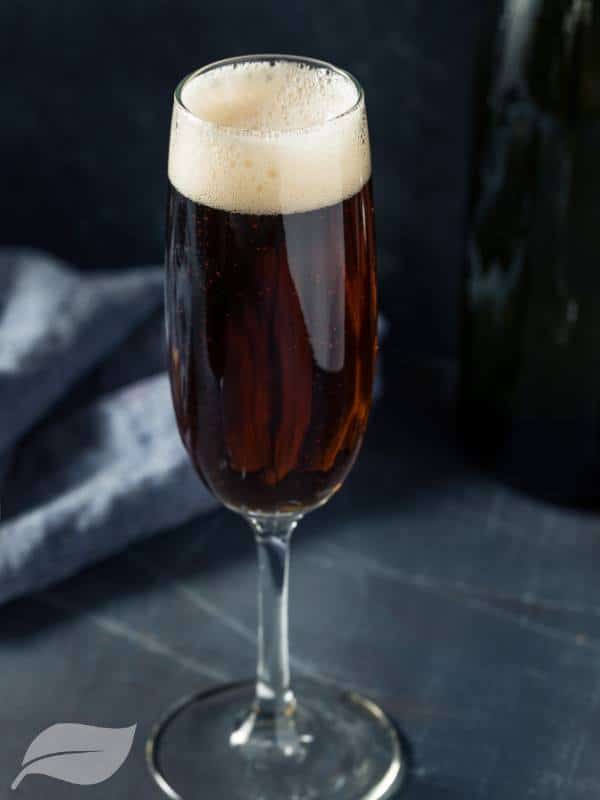 Close up of a Black velvet cocktail in a champagne flute