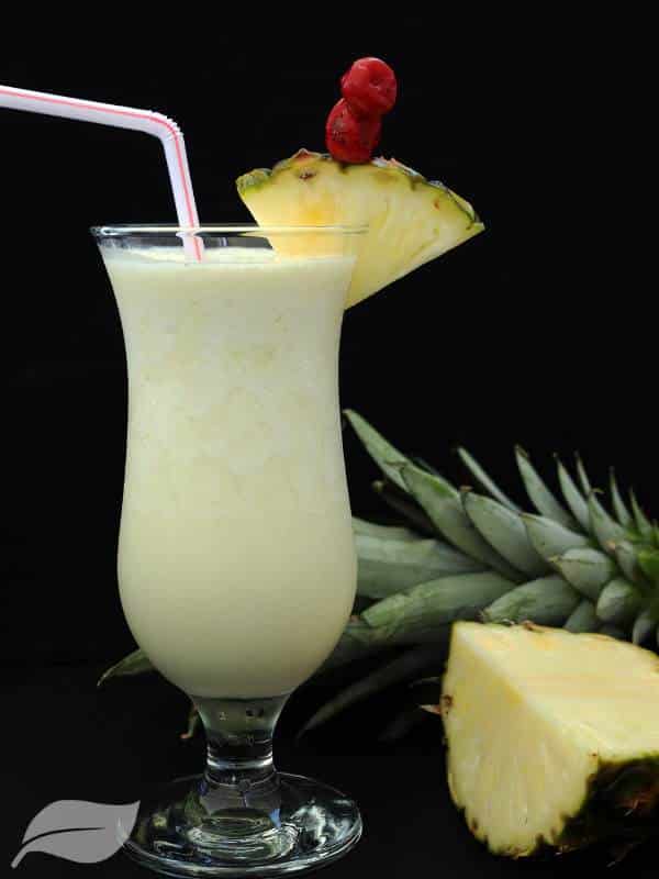 pina colada with pineapple garnish